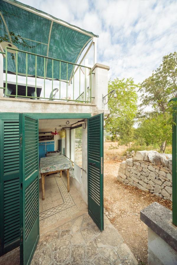Trulli Girasoli E Viole Cocolicchio Kültér fotó